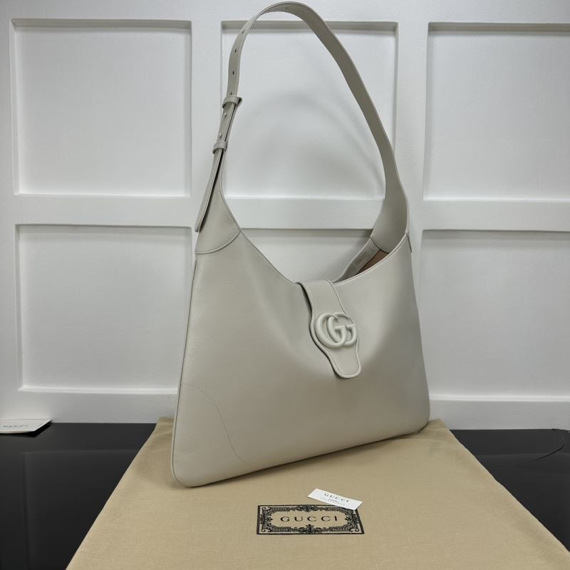 G*u*i top handle bags